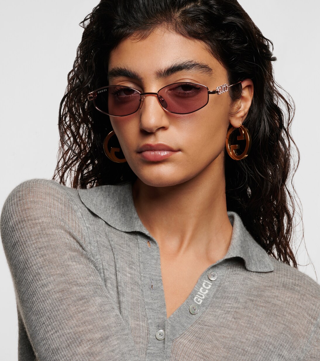 Logo embellished oval sunglasses | Gucci