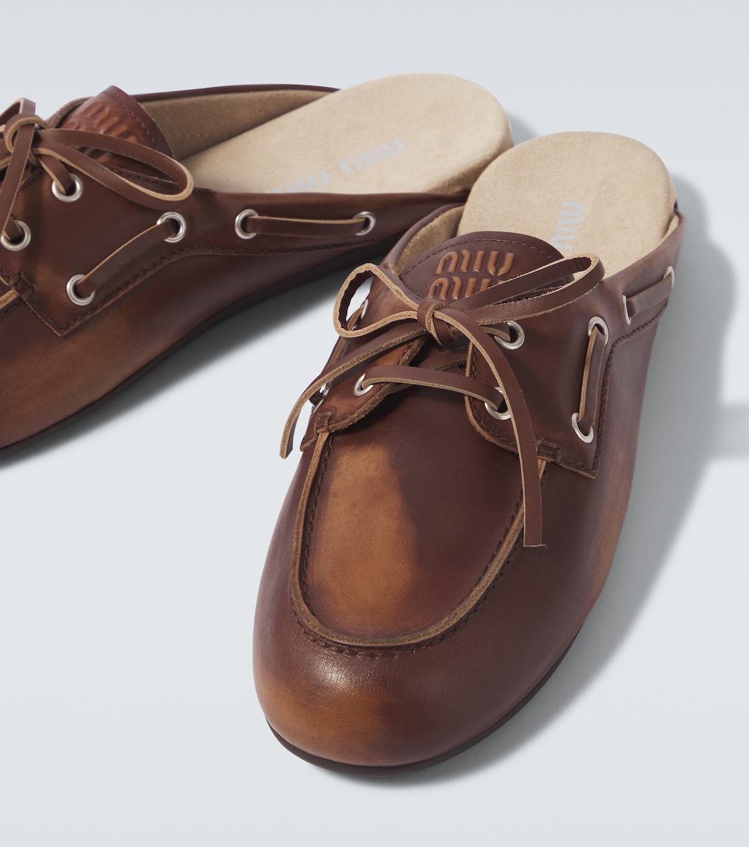 Leather mules | Miu Miu