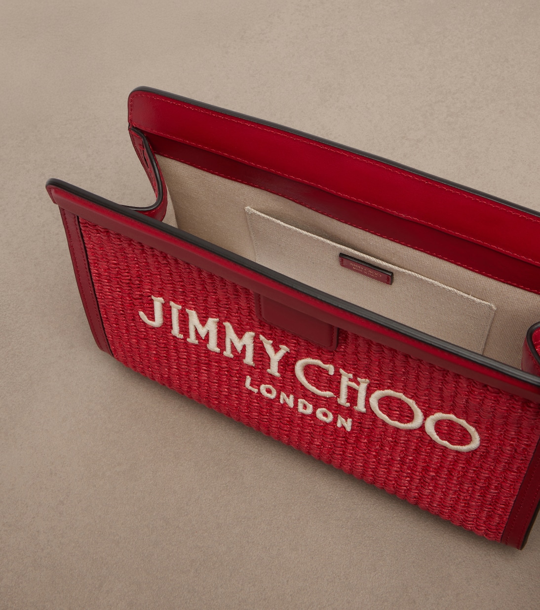 Clutch Avenue Small aus Raffiabast mit Leder | Jimmy Choo