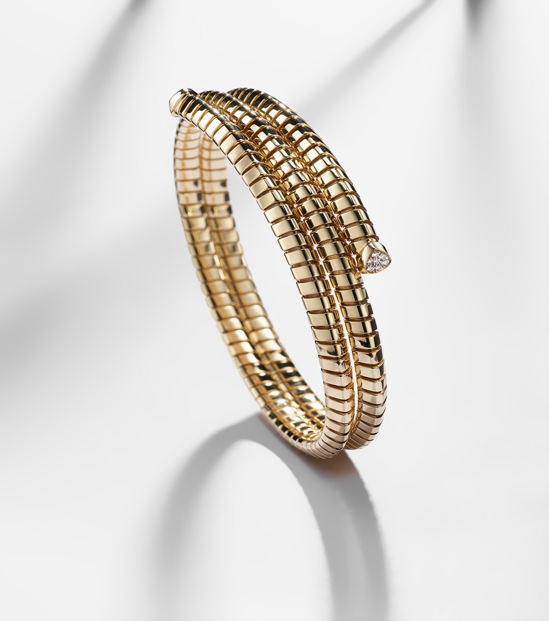 Trisolina Triple 18kt gold bangle with diamonds | Marina B