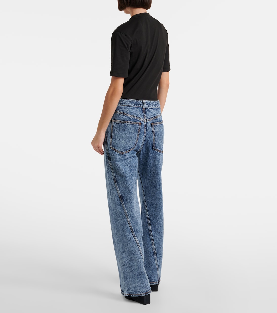 Twisted low-rise wide-leg jeans | Alaïa