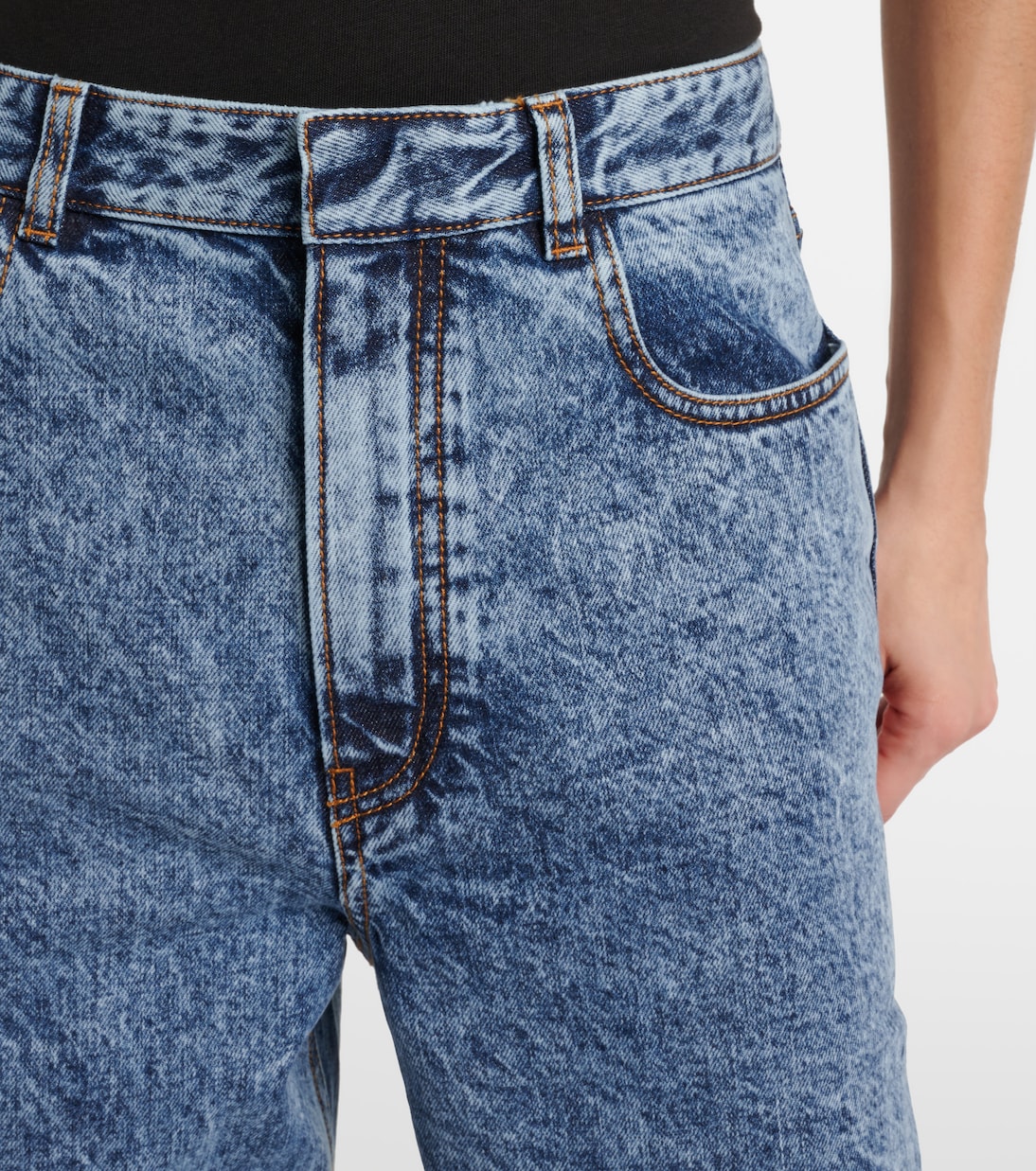 Twisted low-rise wide-leg jeans | Alaïa