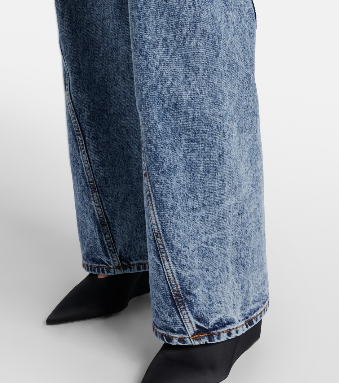 Twisted low-rise wide-leg jeans | Alaïa