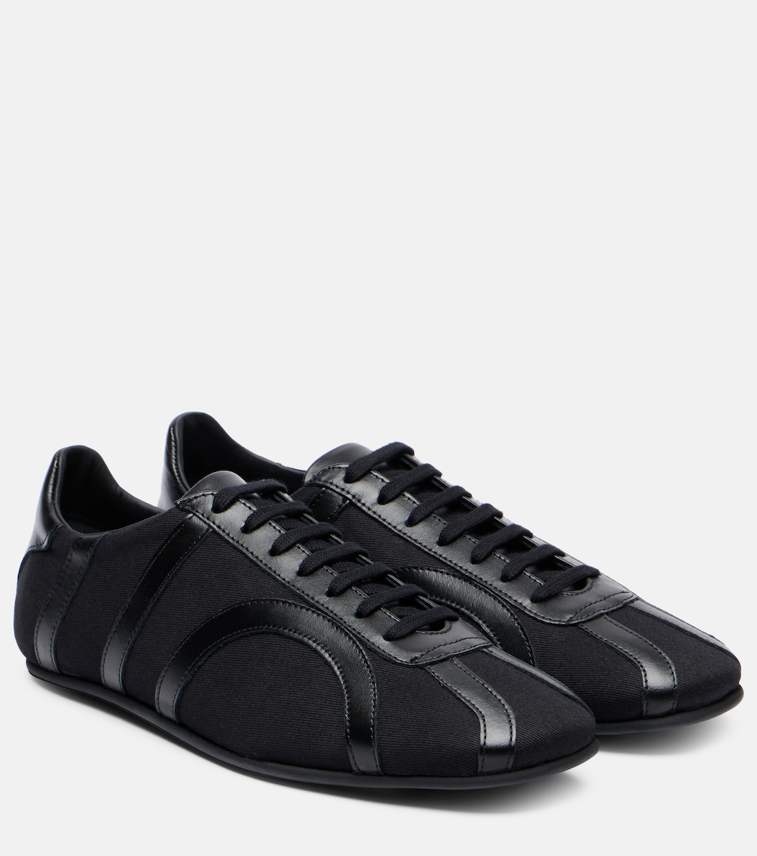 Leather-trimmed sneakers | Toteme