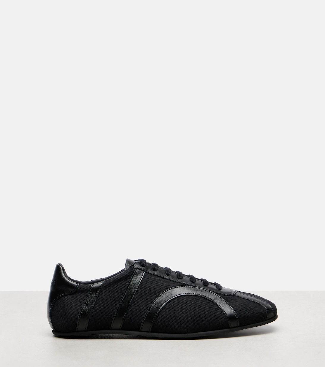 Leather-trimmed sneakers | Toteme