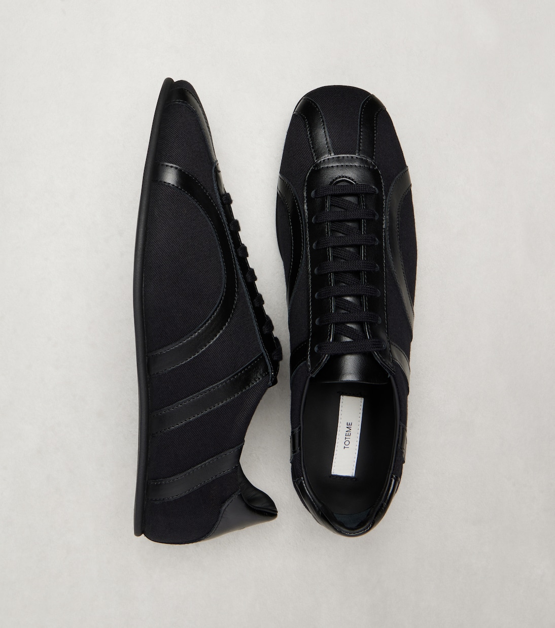 Leather-trimmed sneakers | Toteme