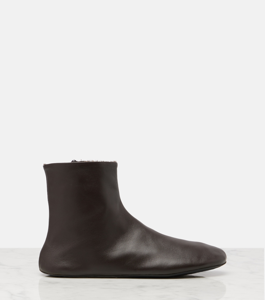 Stella shearling-lined leather ankle boots | The Row