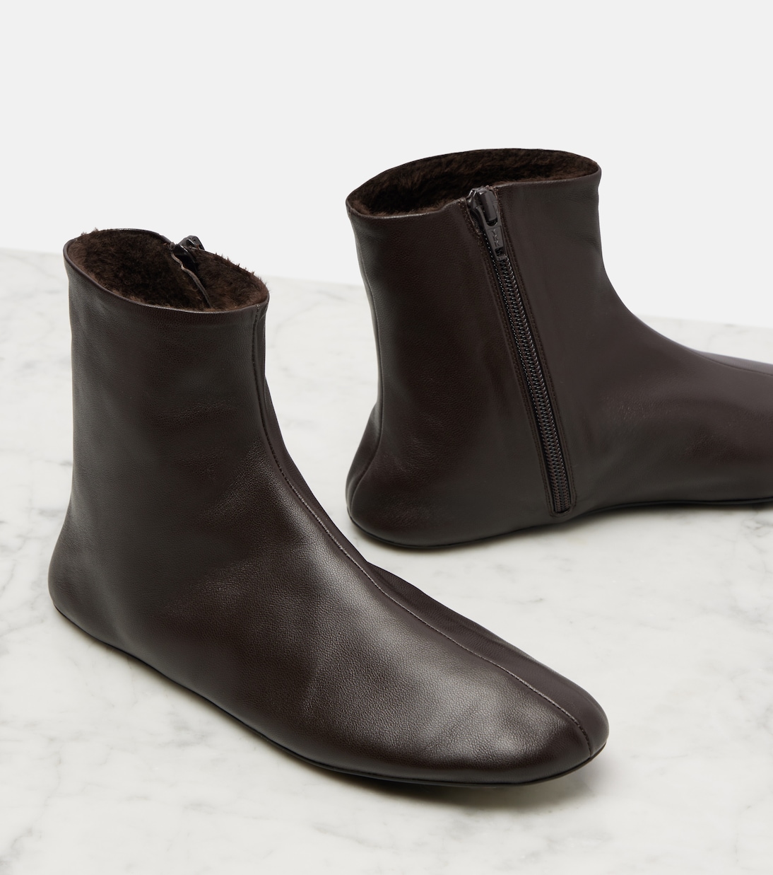 Stella shearling-lined leather ankle boots | The Row