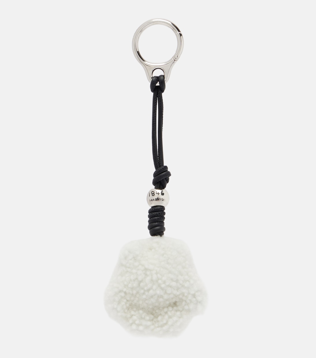 Paw shearling and leather bag charm | Loewe