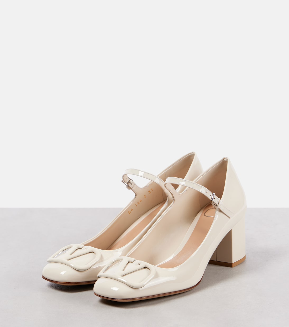 VLogo Signature patent leather Mary Jane pumps | Valentino Garavani
