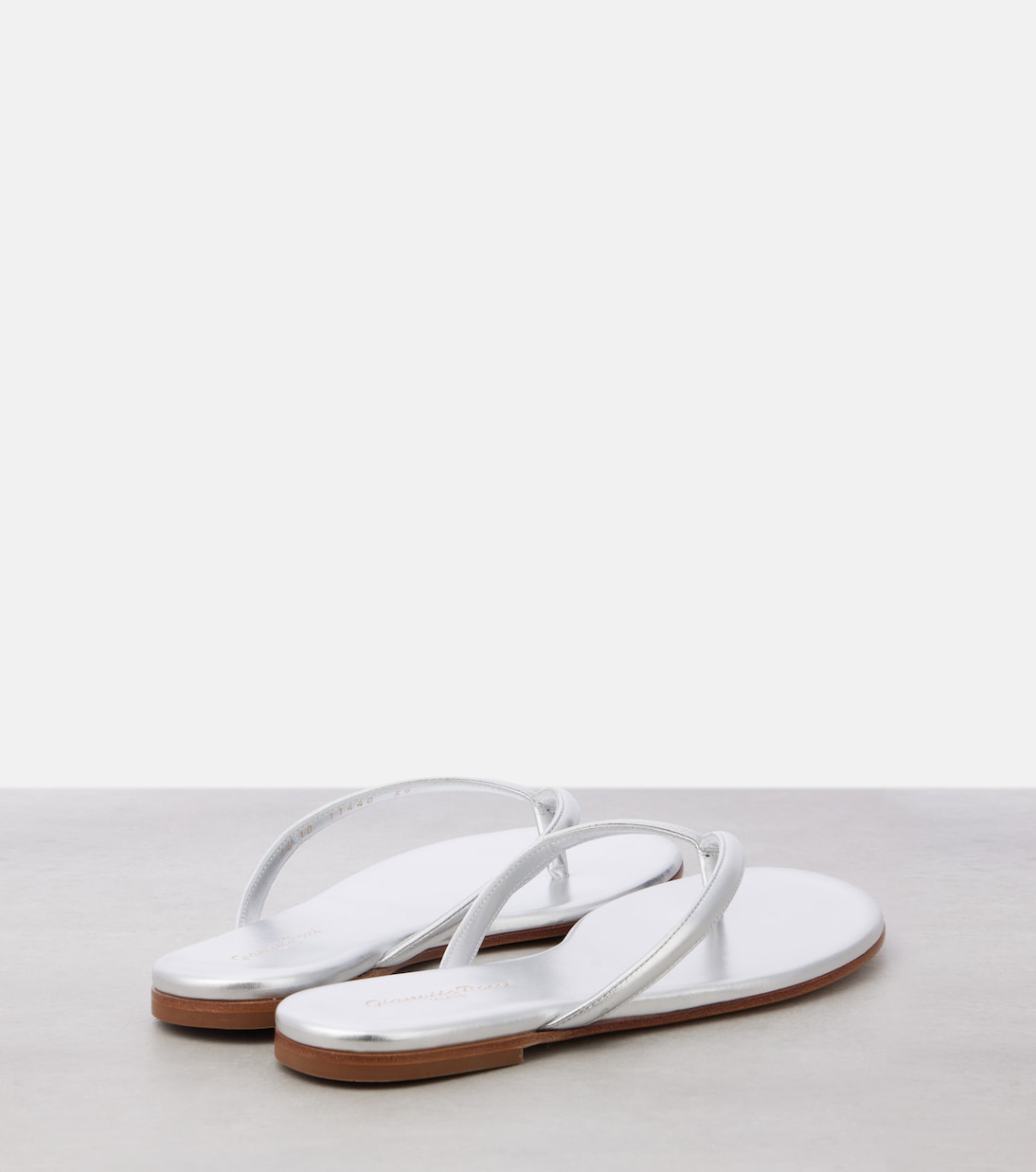 Calypso metallic leather thong sandals | Gianvito Rossi