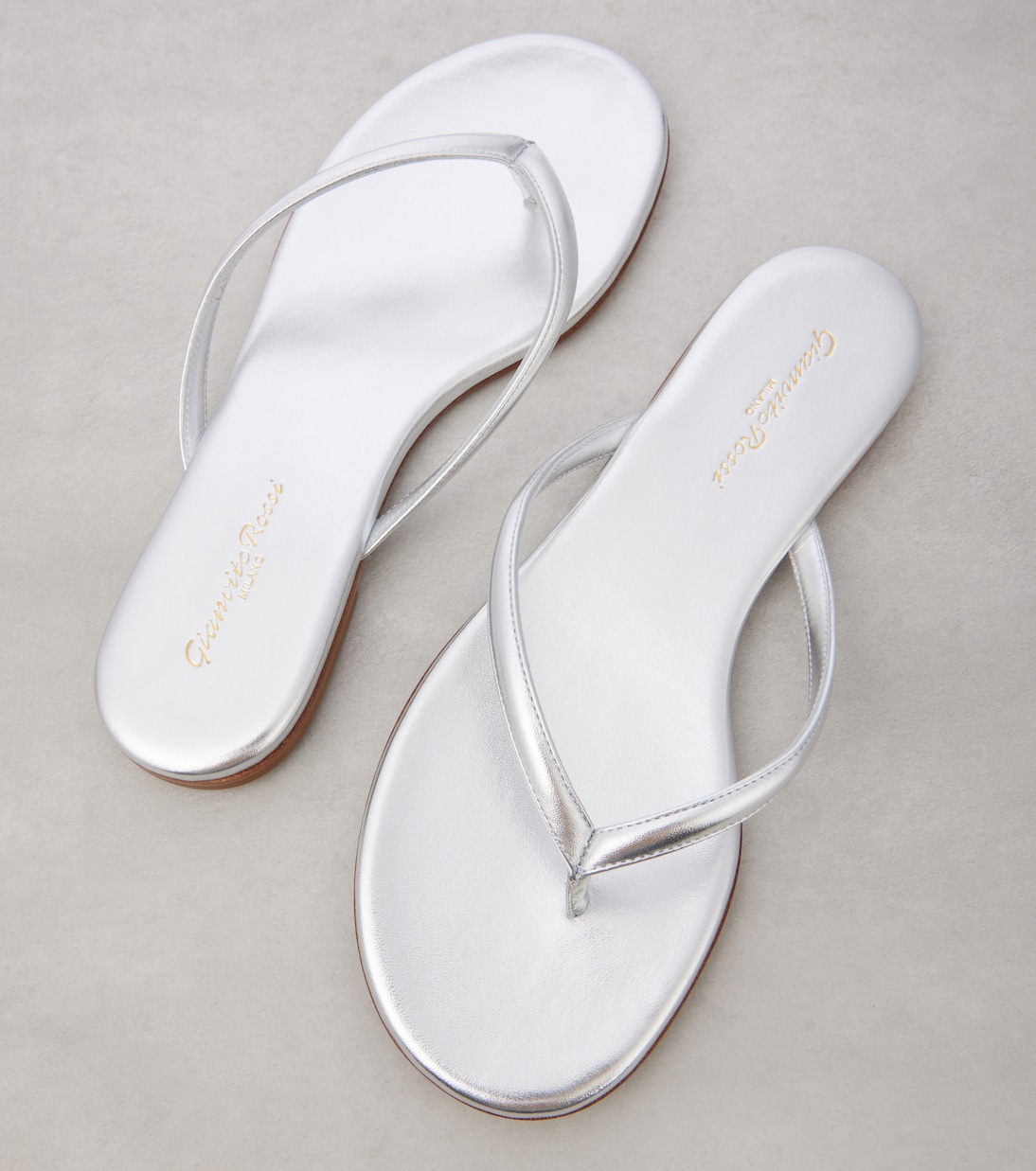 Calypso metallic leather thong sandals | Gianvito Rossi