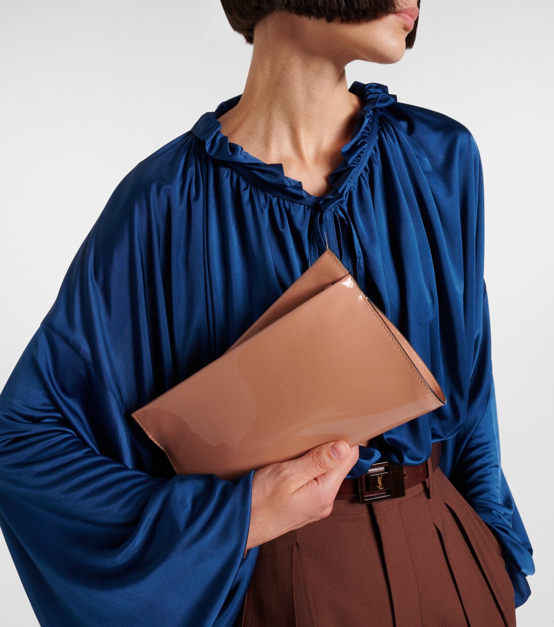 Loubitwist Small patent leather clutch | Christian Louboutin