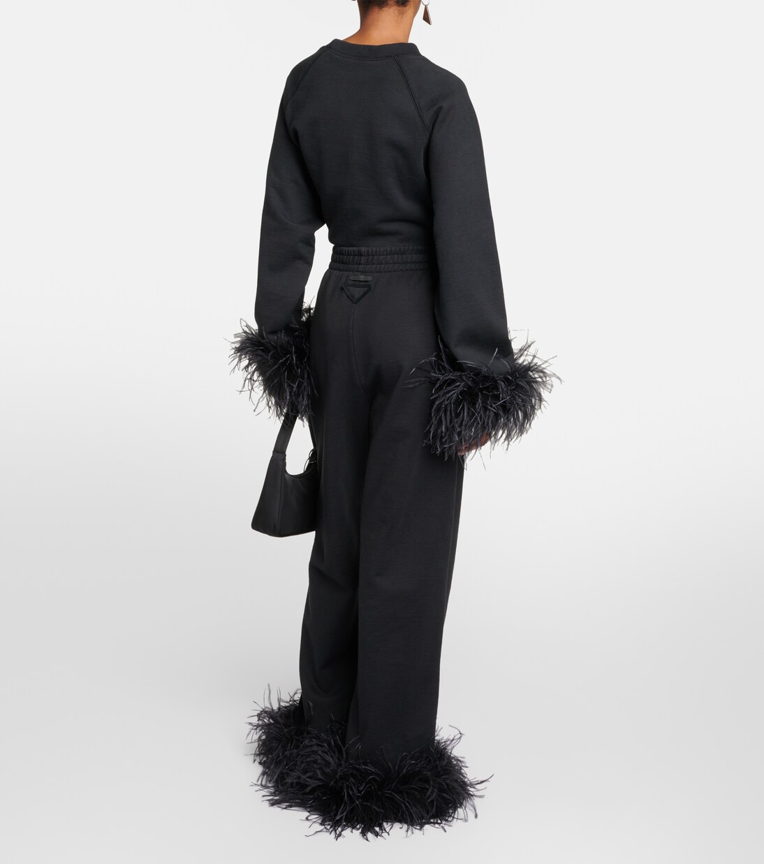 Pantalones deportivos de algodón con plumas | Prada