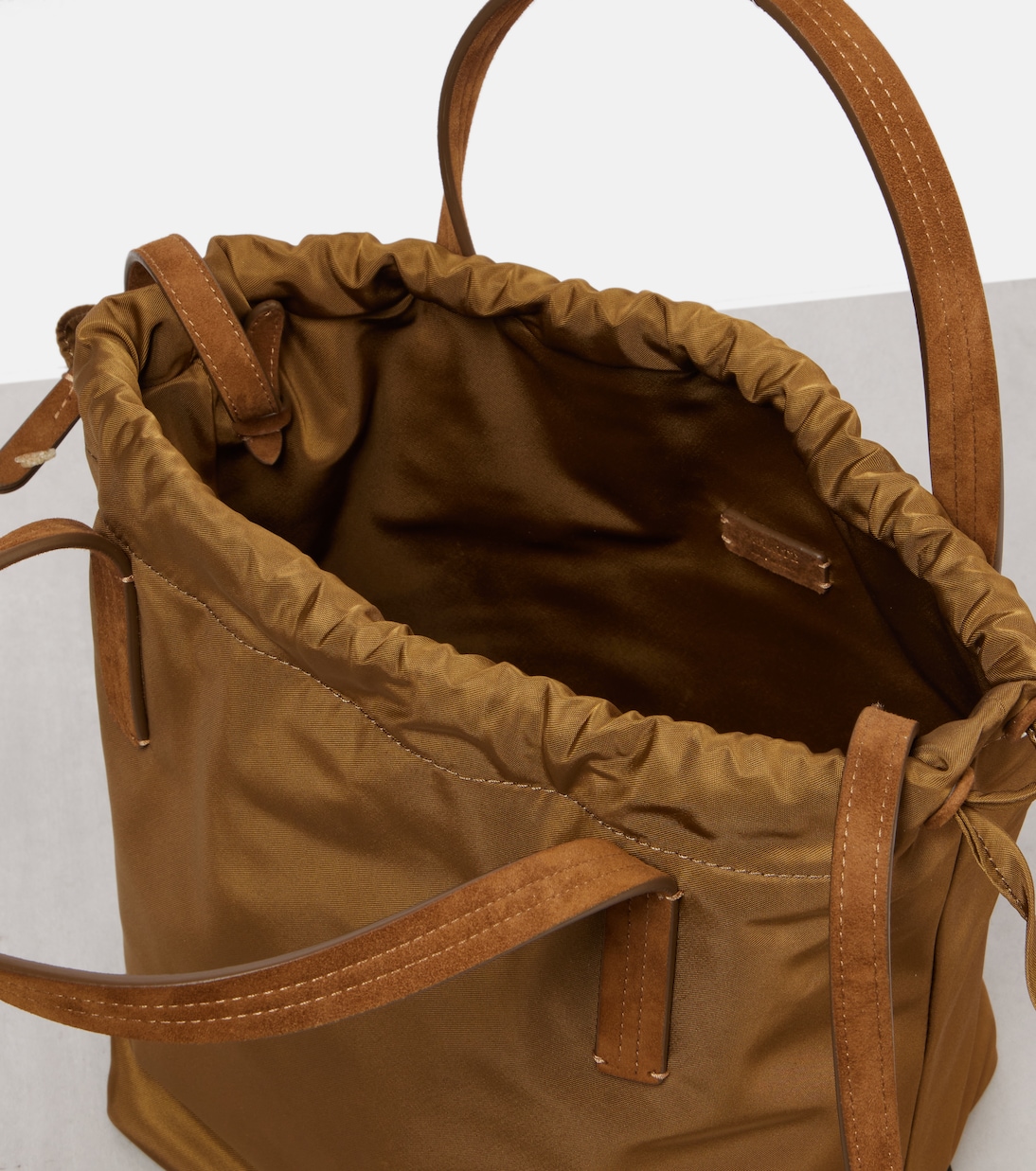 Rory Medium leather-trimmed bucket bag | Khaite