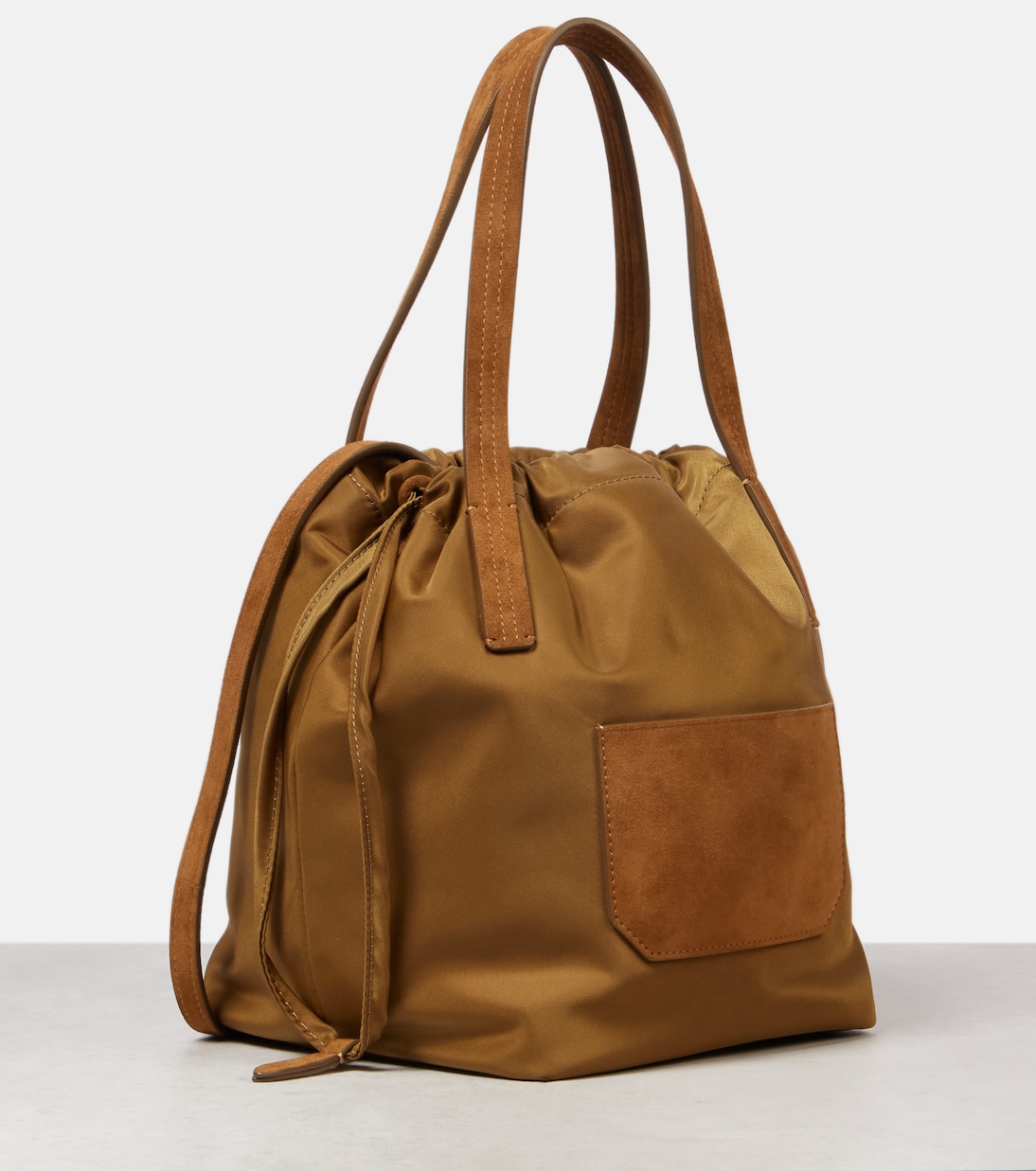 Rory Medium leather-trimmed bucket bag | Khaite