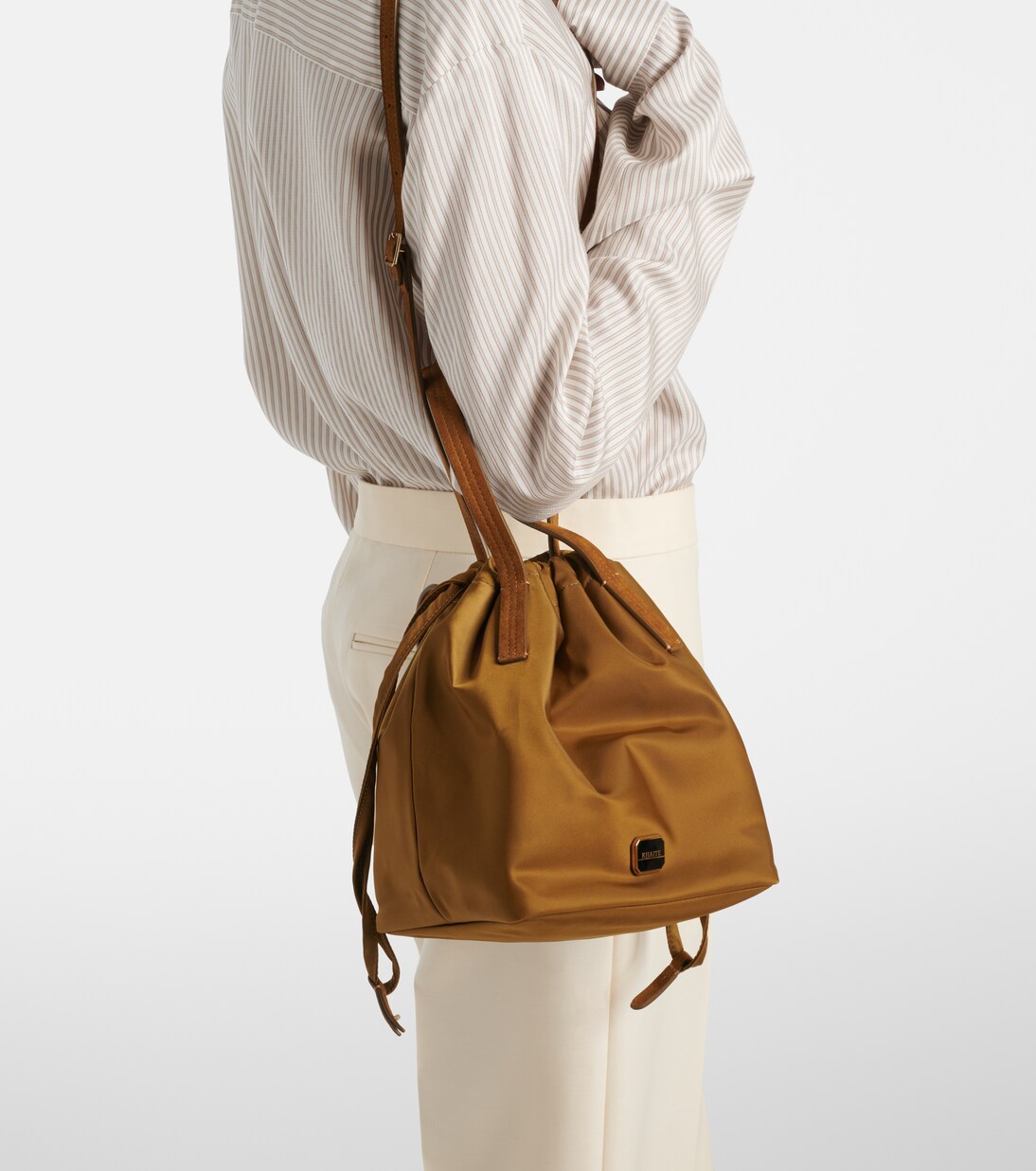 Rory Medium leather-trimmed bucket bag | Khaite