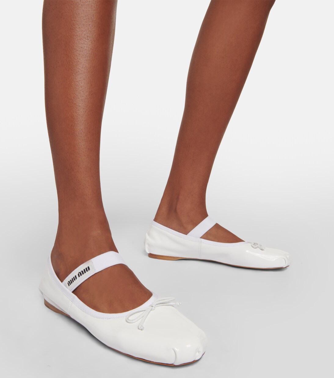 Ballerine in vernice con logo | Miu Miu