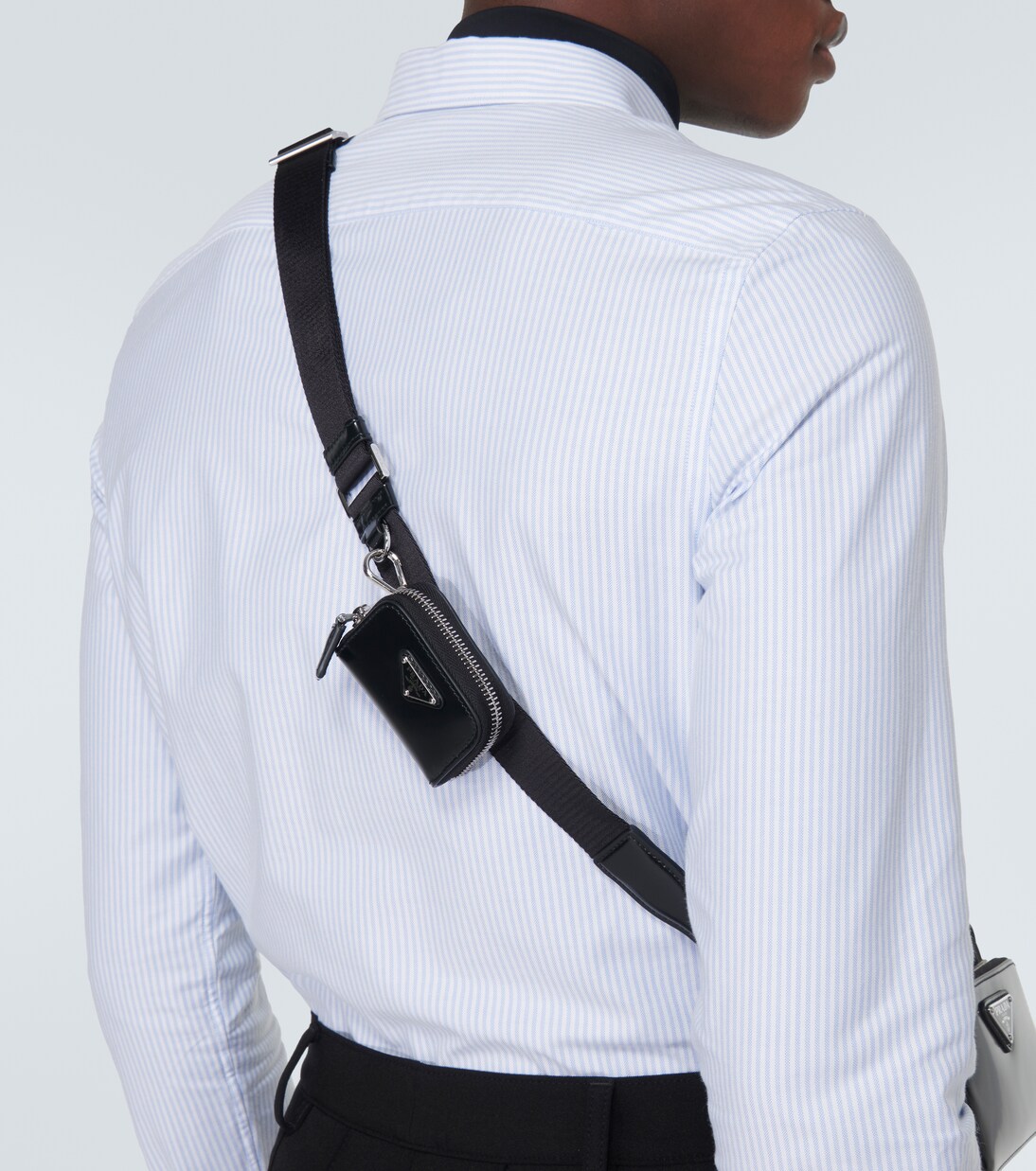 Leather-trimmed crossbody bag | Prada