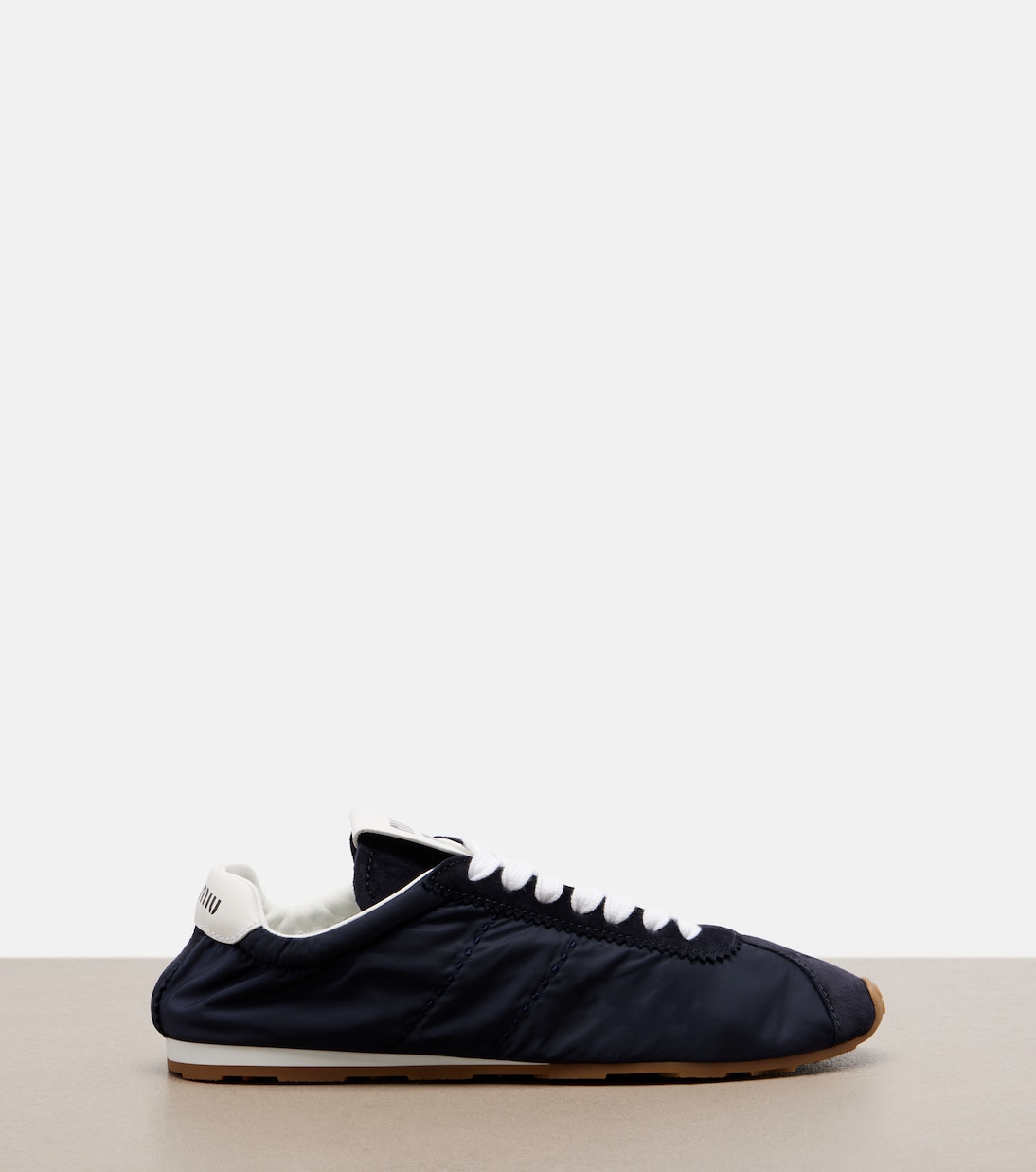 Plume suede-trimmed sneakers | Miu Miu
