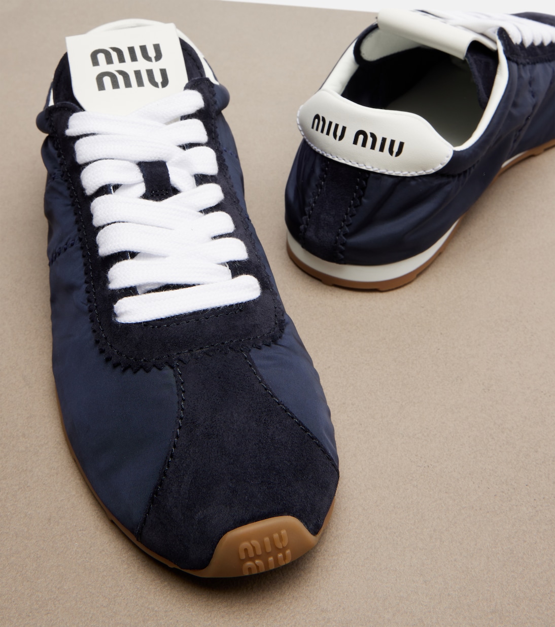 Plume suede-trimmed sneakers | Miu Miu