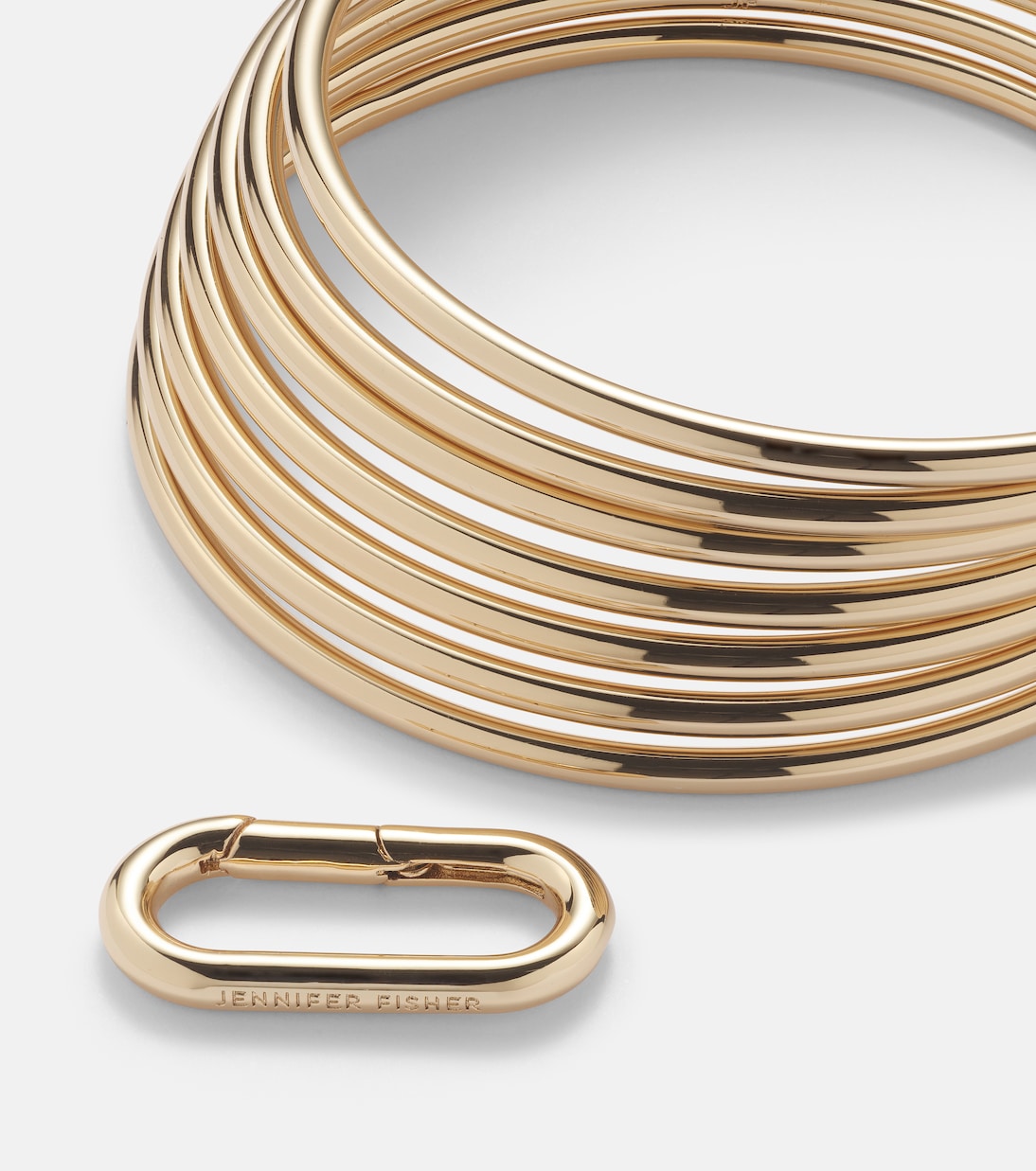 Set aus sieben Armreifen, 10kt vergoldet | Jennifer Fisher