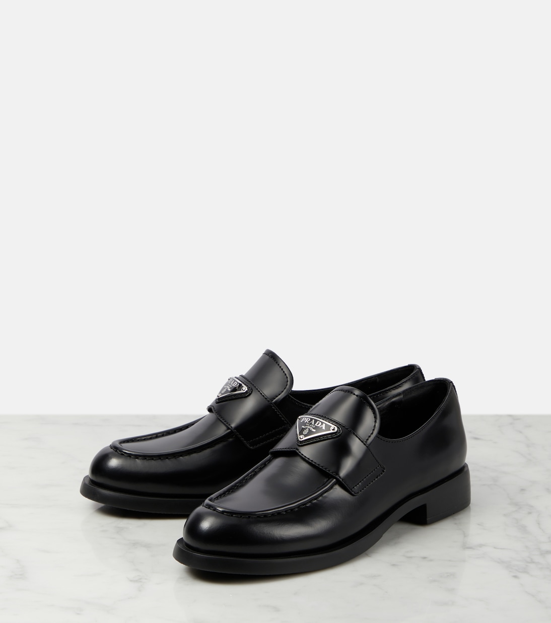 Logo leather loafers | Prada