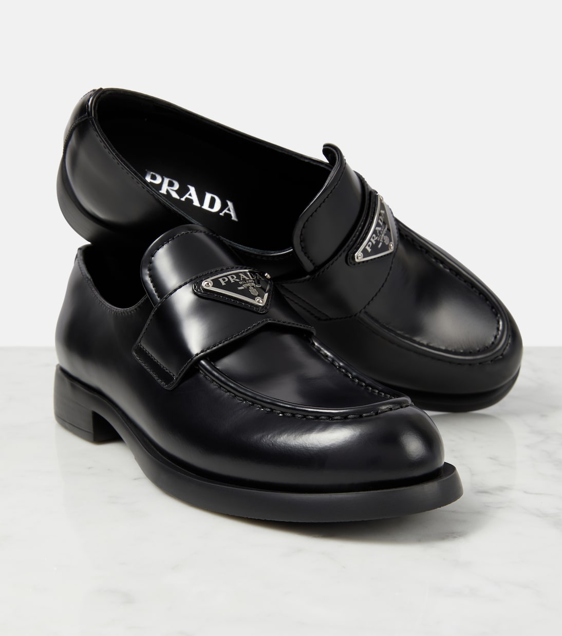Logo leather loafers | Prada
