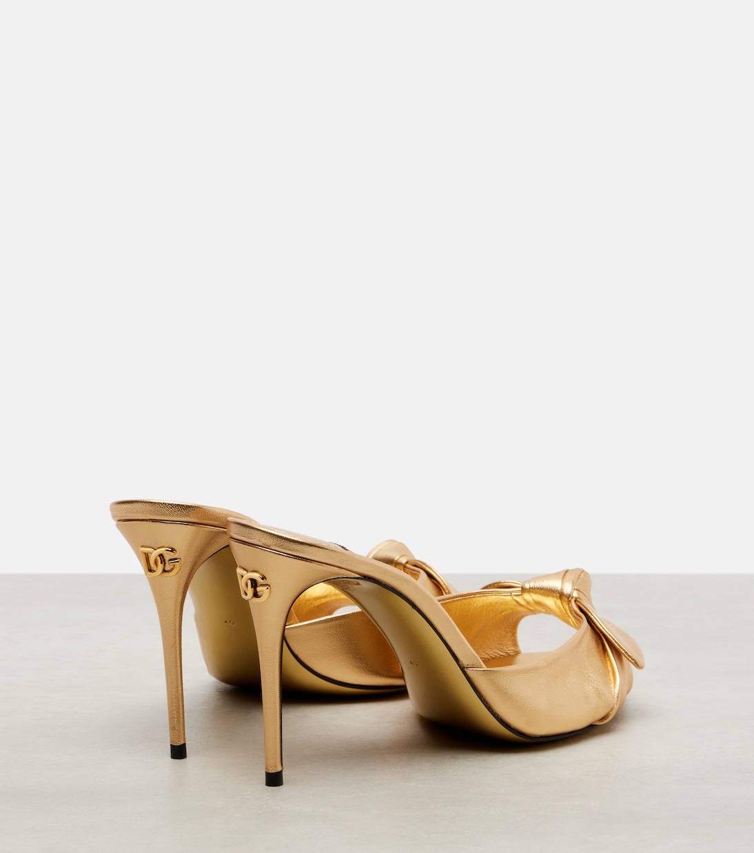 Mules in pelle metallizzata con fiocco | Dolce&Gabbana