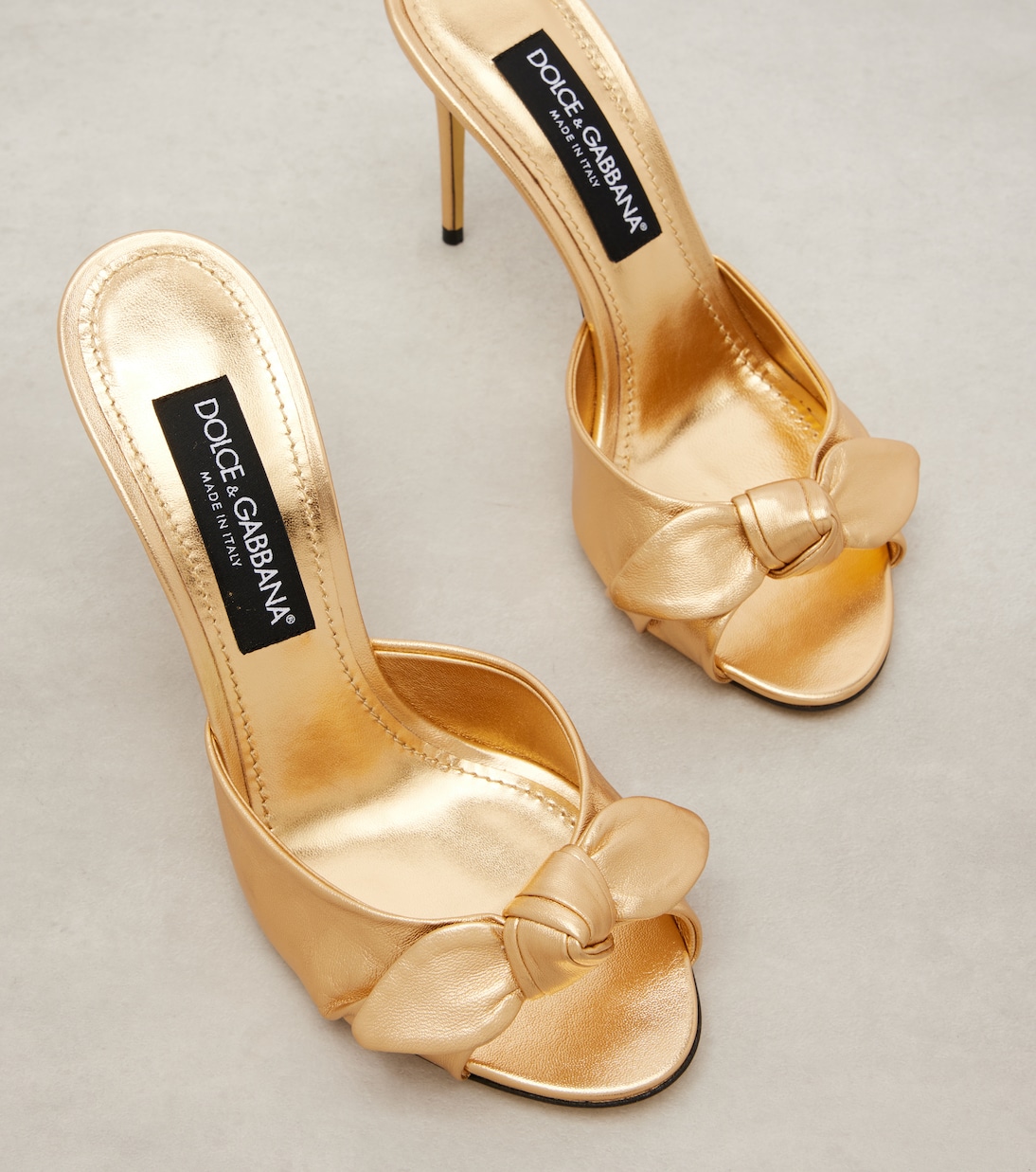 Mules in pelle metallizzata con fiocco | Dolce&Gabbana