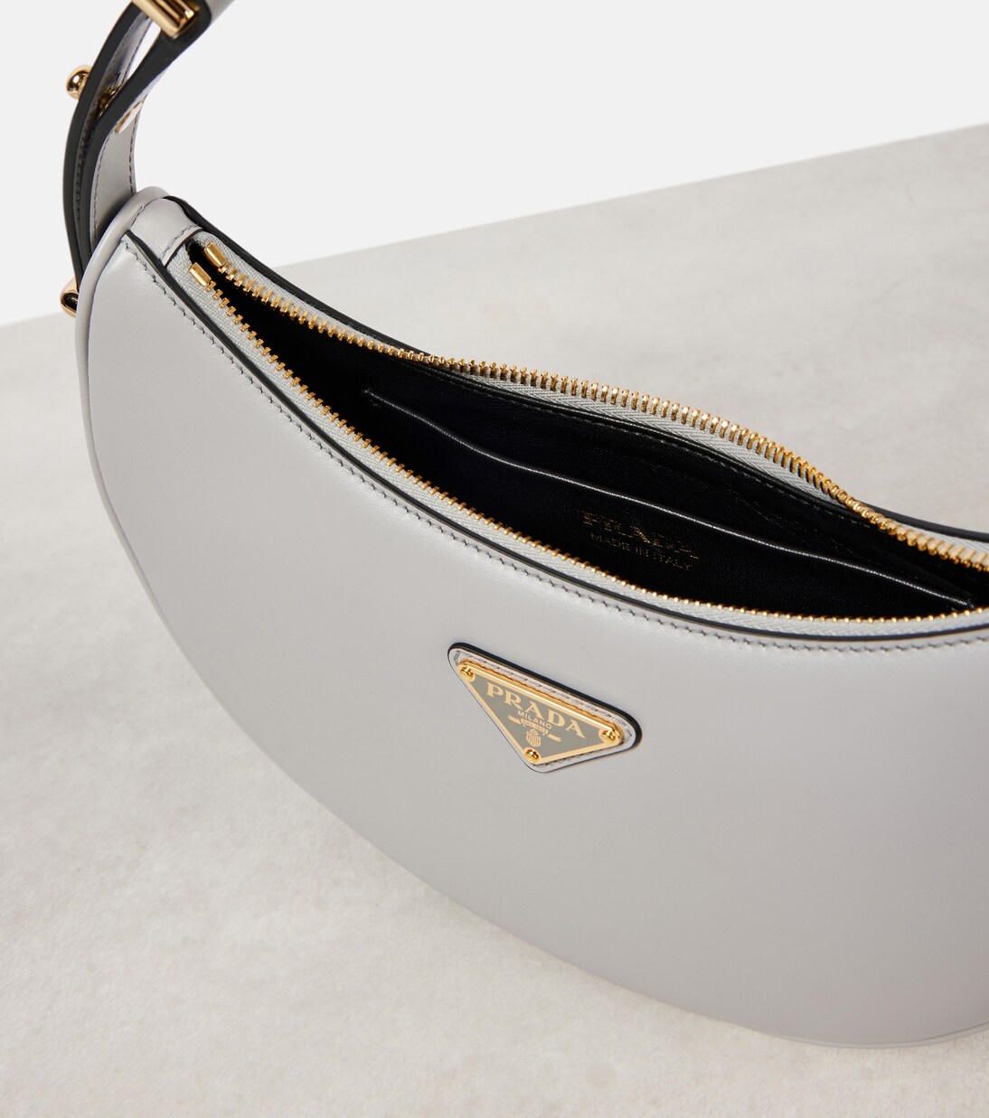 Arqué Small leather shoulder bag | Prada