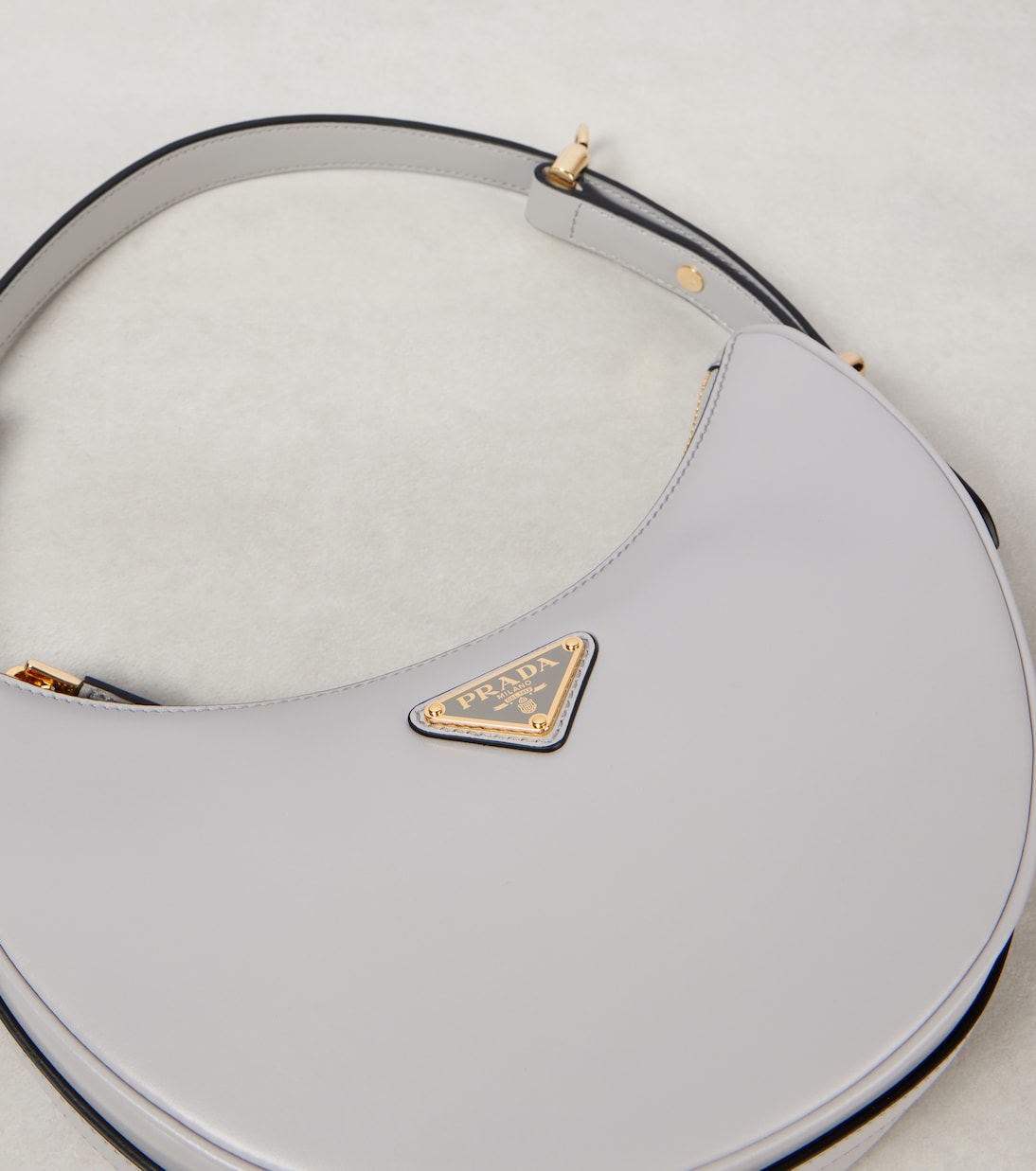 Arqué Small leather shoulder bag | Prada