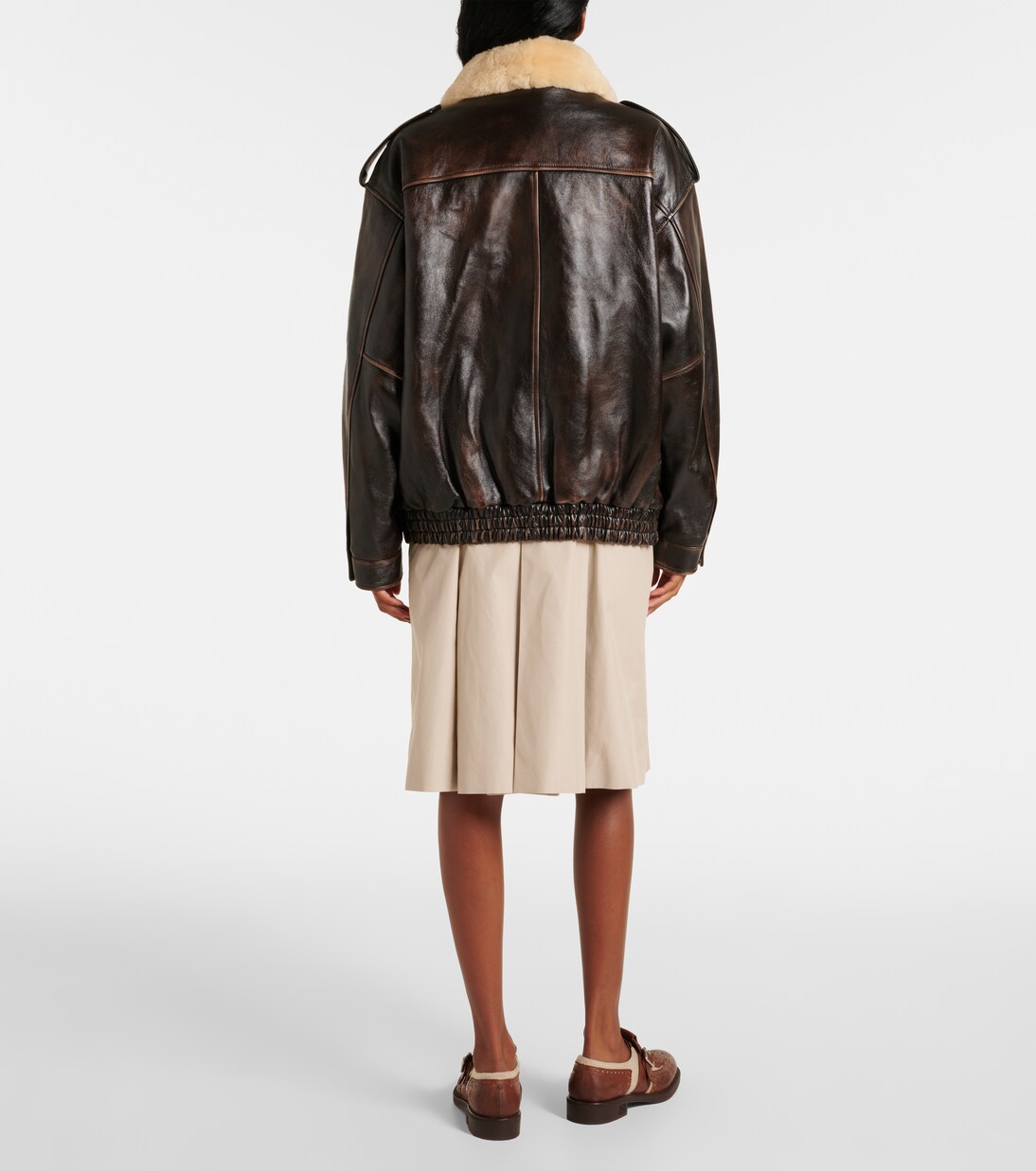 Veste en cuir et shearling à logo | Miu Miu