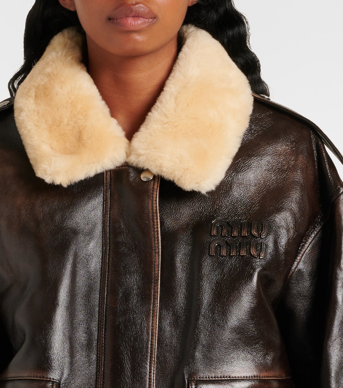 Veste en cuir et shearling à logo | Miu Miu