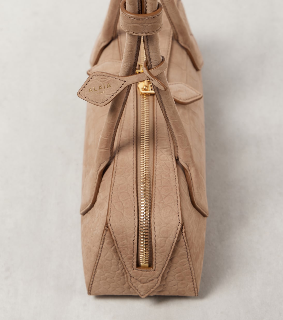 Le Teckel Small croc-effect shoulder bag | Alaïa