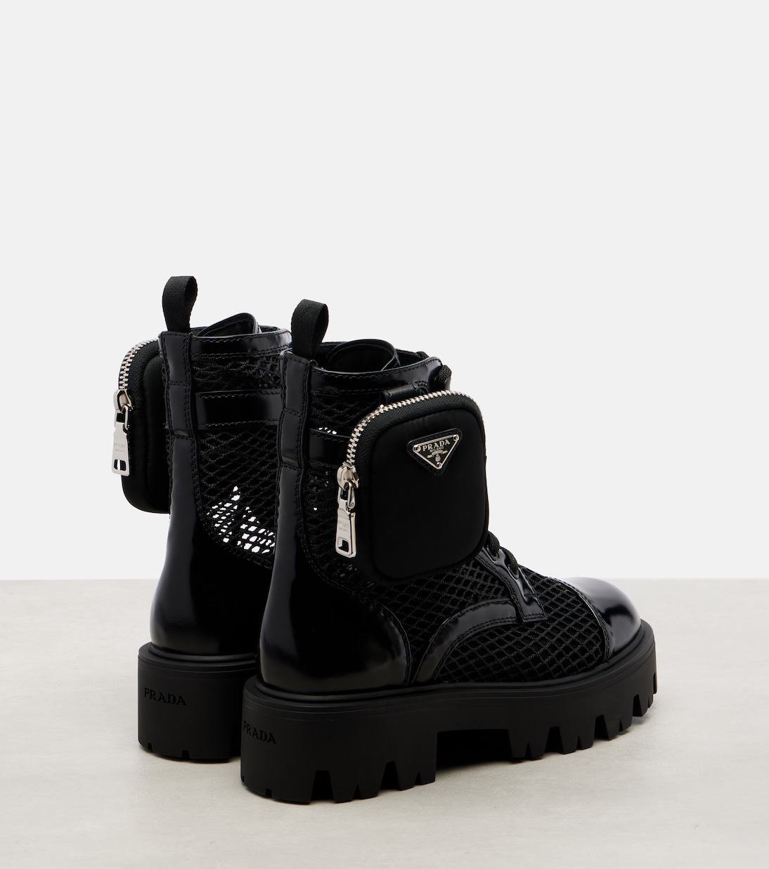 Leather-trimmed mesh combat boots | Prada