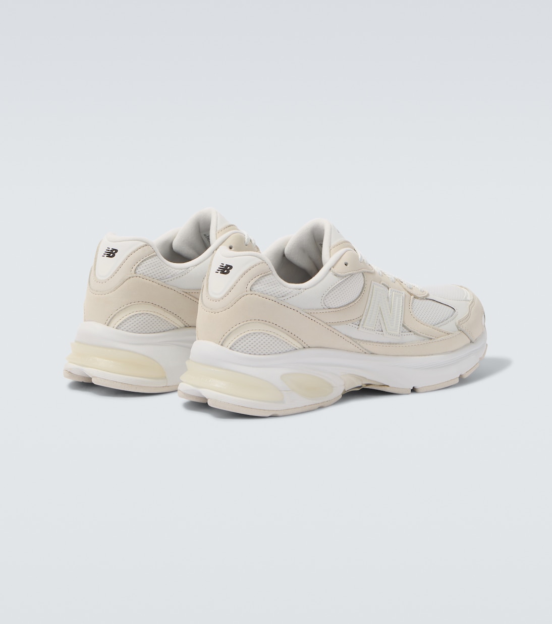 x New Balance 2010 leather-trimmed sneakers | Comme des Garçons Homme