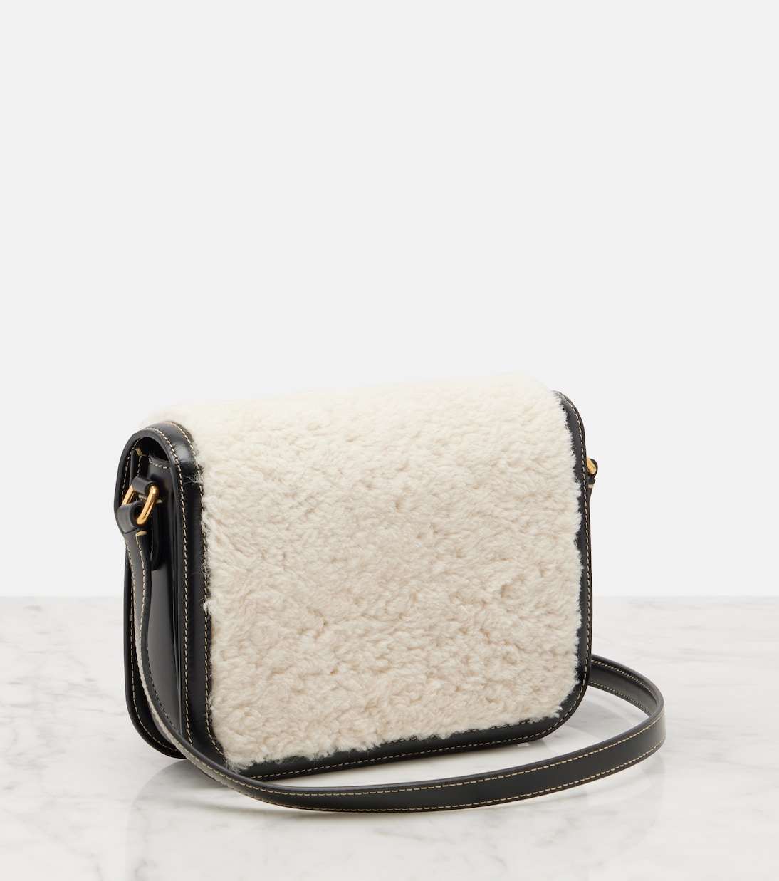 9TO5 shearling and leather shoulder bag | Valentino Garavani