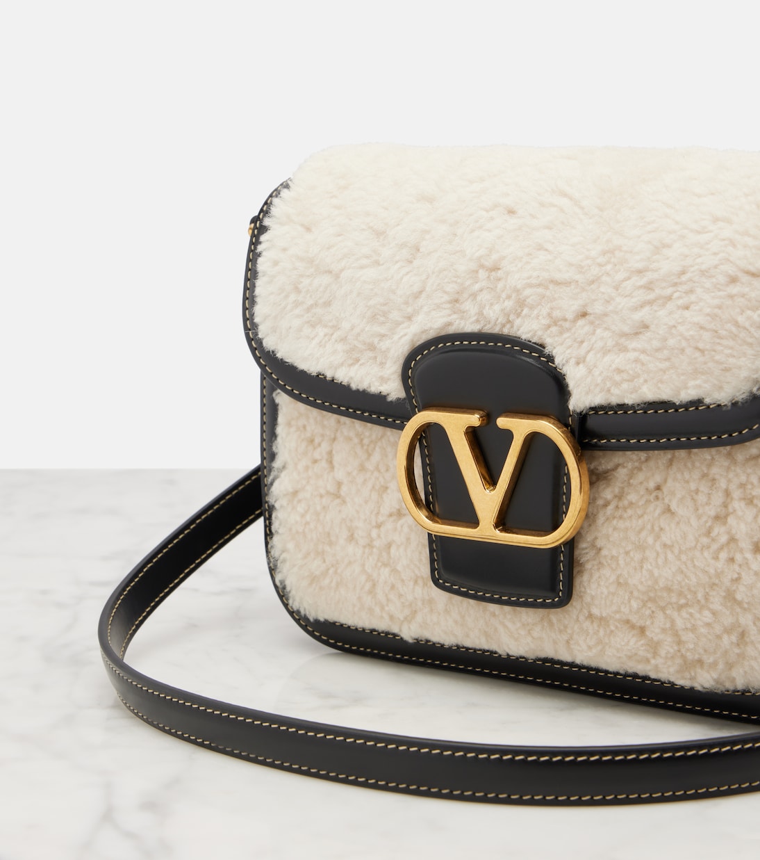 9TO5 shearling and leather shoulder bag | Valentino Garavani