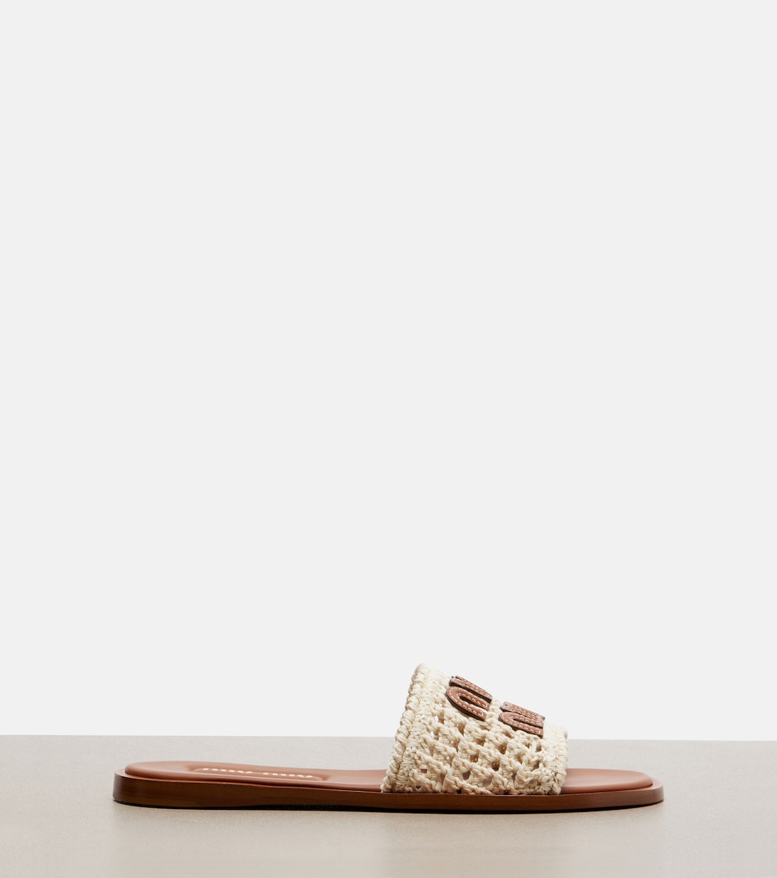 Mules à finitions en cuir | Miu Miu