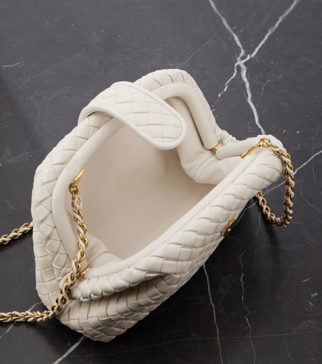 Lauren 1980 Intrecciato Small leather clutch | Bottega Veneta