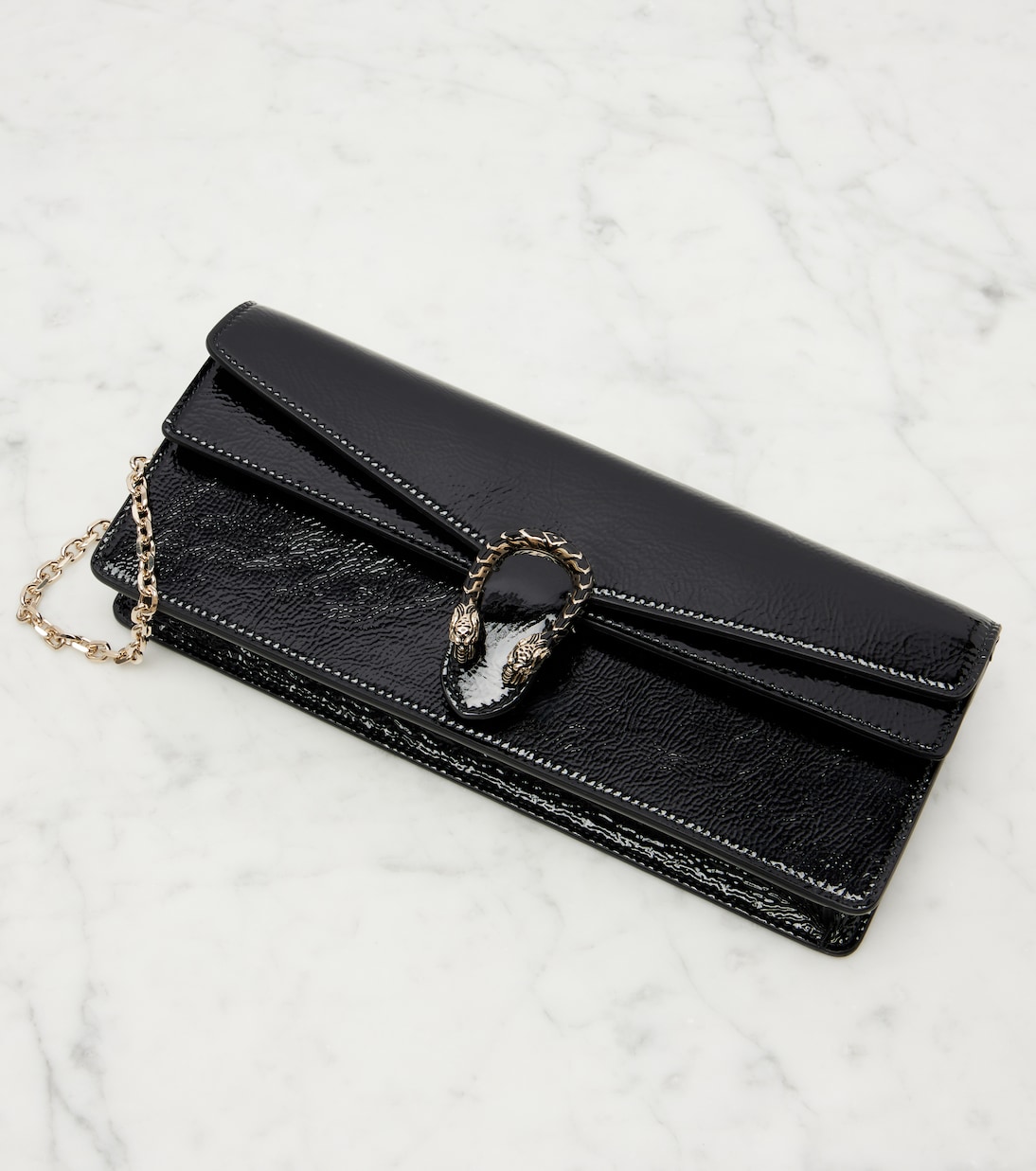 Dionysus patent leather clutch | Gucci