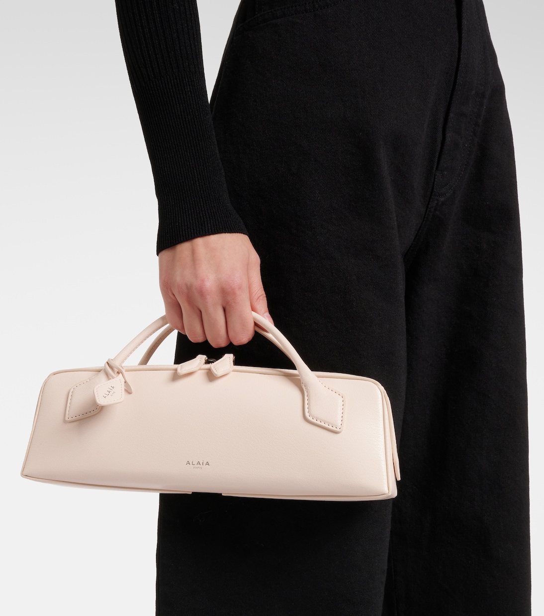 Le Teckel leather clutch | Alaïa