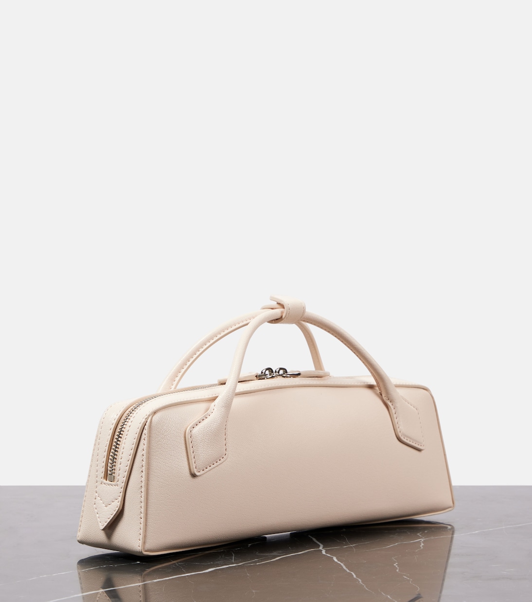 Le Teckel leather clutch | Alaïa