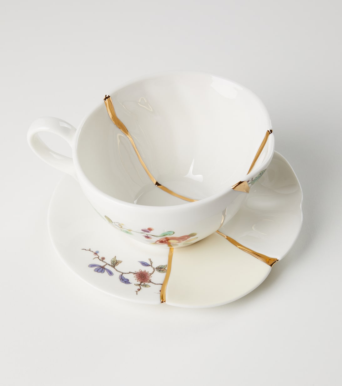 Kintsugi gold-plated porcelain teacup and saucer set by Marcantonio Raimondi Malerba | Seletti