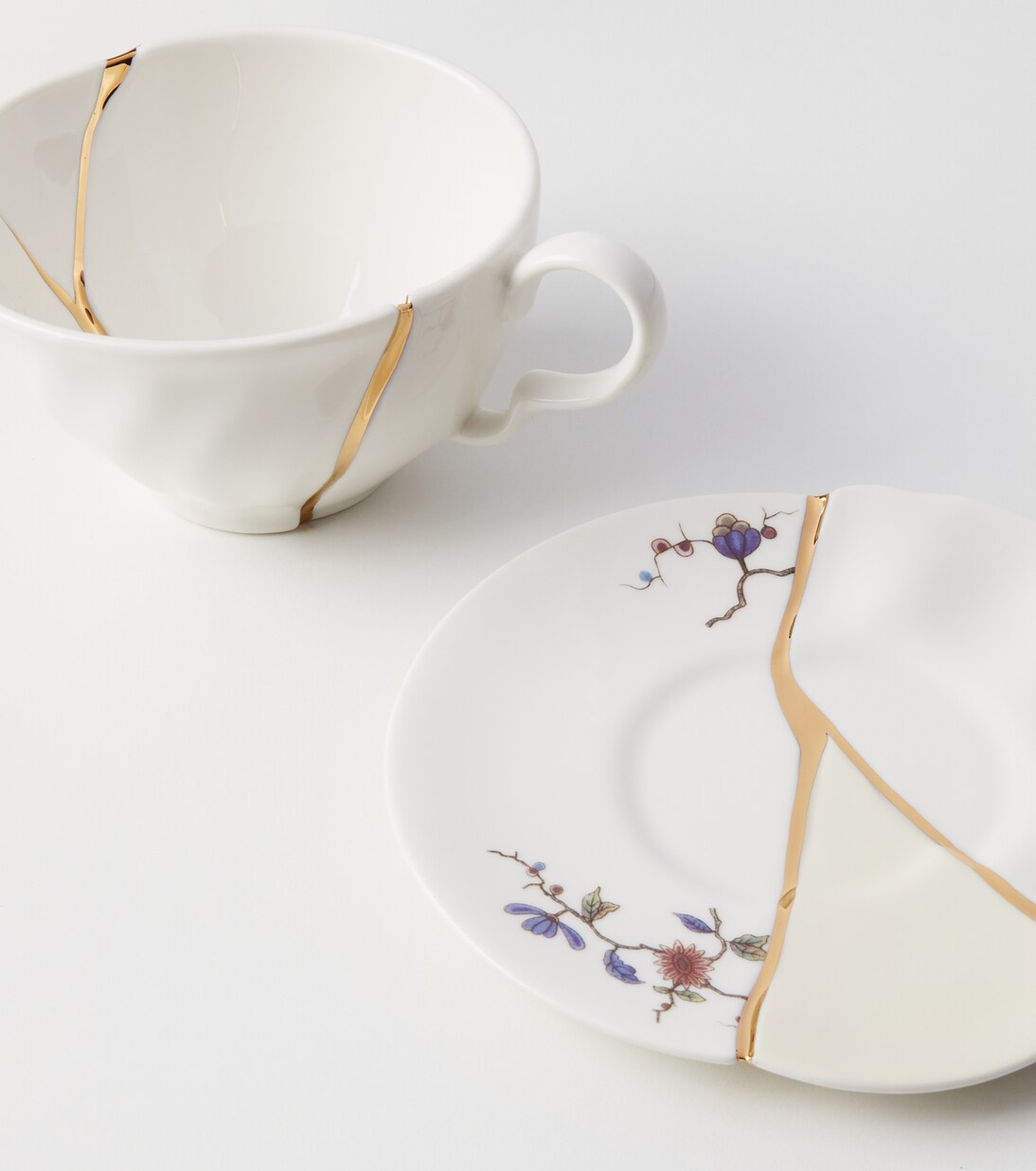 Kintsugi gold-plated porcelain teacup and saucer set by Marcantonio Raimondi Malerba | Seletti