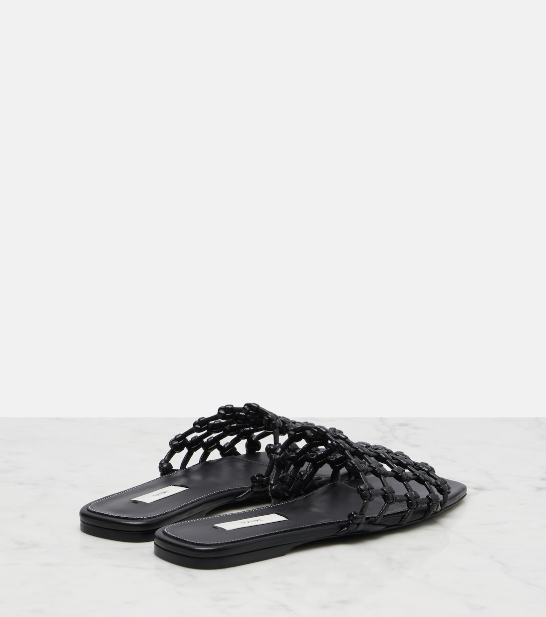 Woven leather slides | Toteme