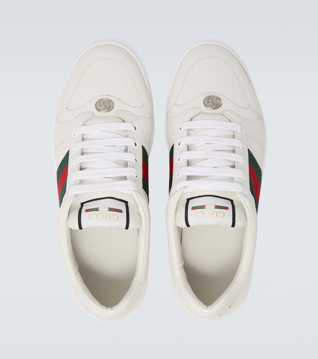 Screener debossed leather sneakers | Gucci