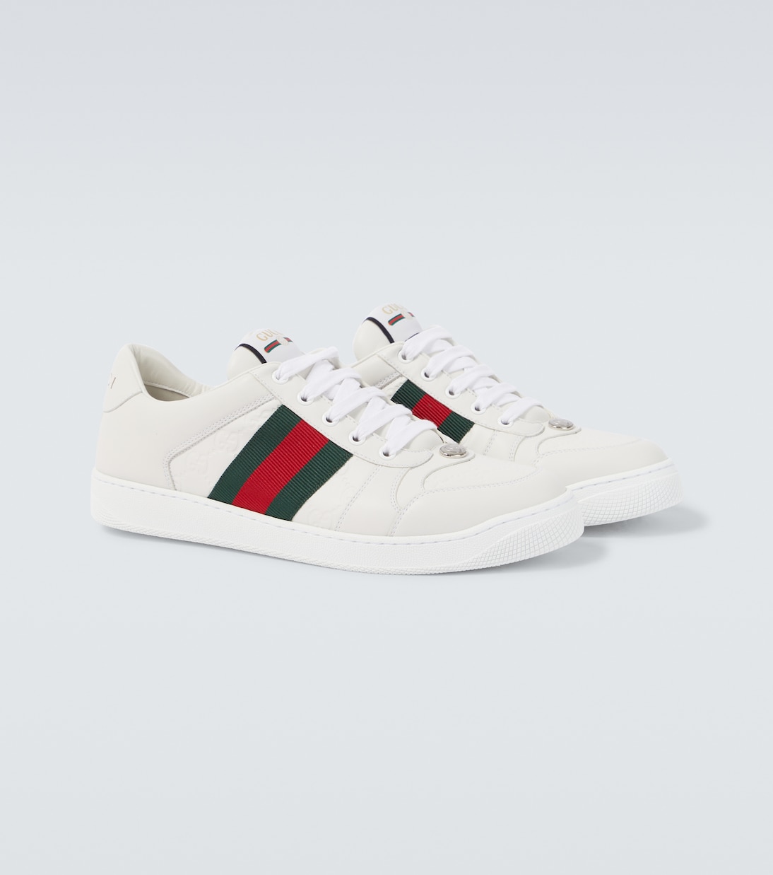 Screener debossed leather sneakers | Gucci