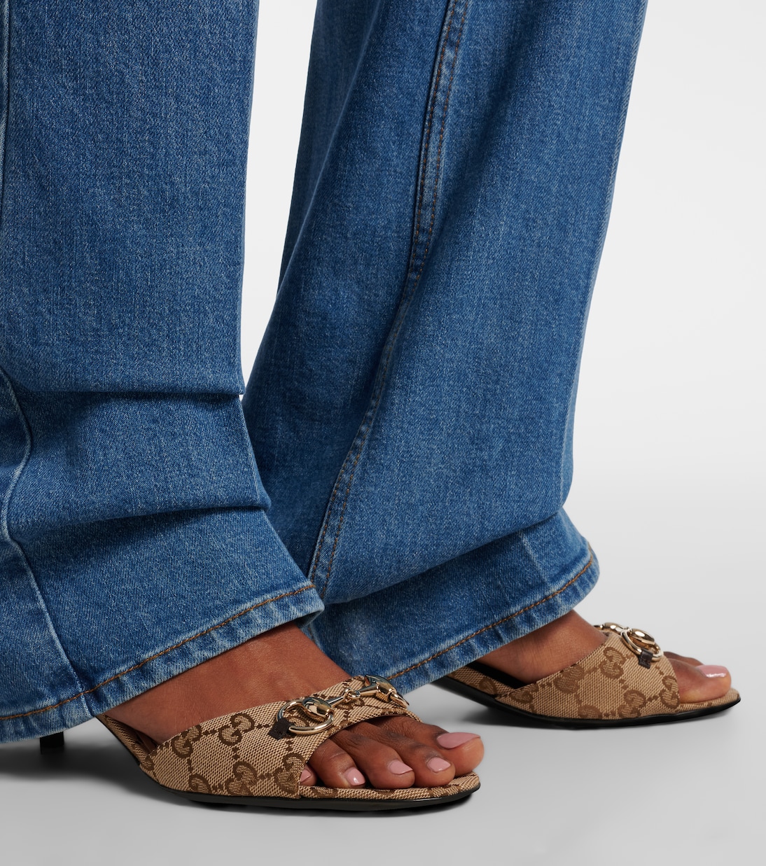 Mules Erin in canvas GG con Horsebit | Gucci